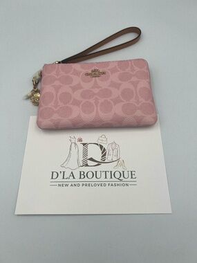 Coach Corner Zip Wristlet In Signature Canvas Powder Pink With Charms